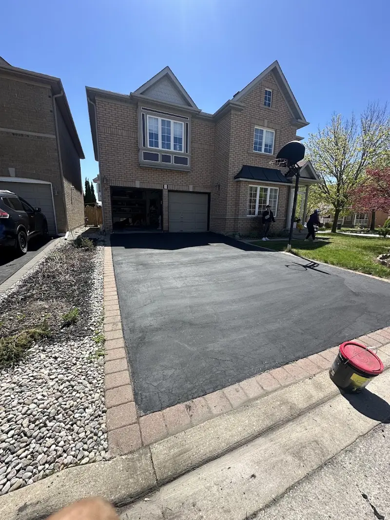 Newly sealed asphalt driveway